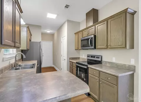 Kitchen - 151 Mintz Ln, Cantonment, FL 32533 photo 1 of 13