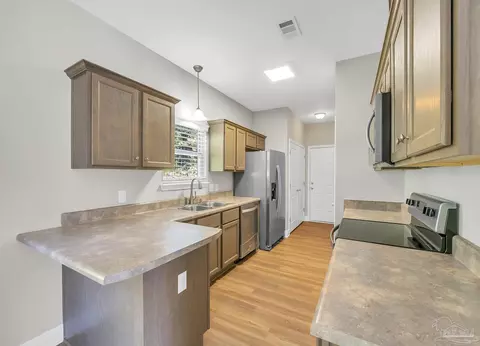 Kitchen - 151 Mintz Ln, Cantonment, FL 32533 photo 5 of 13