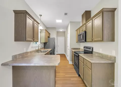 Kitchen - 151 Mintz Ln, Cantonment, FL 32533 photo 4 of 13