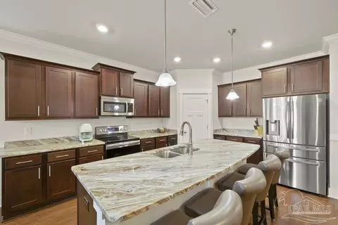 Kitchen - 5577 Caden Ct, Pace, FL 32571 photo 3 of 5