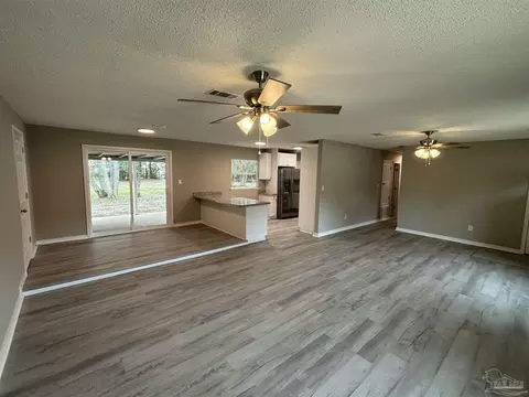 Living - 4445 Thomastown Dr, Pace, FL 32571 photo 4 of 5