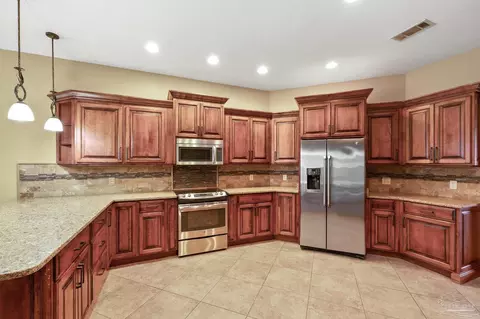 Kitchen - 5497 Oakmont Dr, Pace, FL 32571 photo 4 of 4