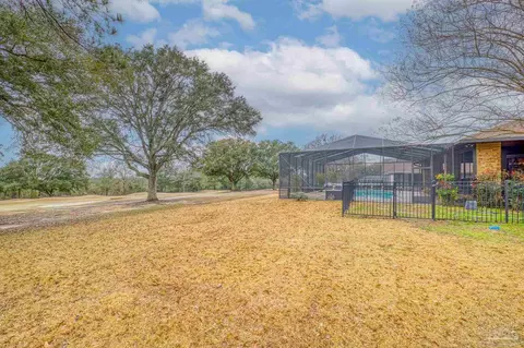 Exterior - 5497 Oakmont Dr, Pace, FL 32571 photo 14 of 15