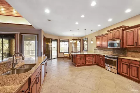 Kitchen - 5497 Oakmont Dr, Pace, FL 32571 photo 3 of 4