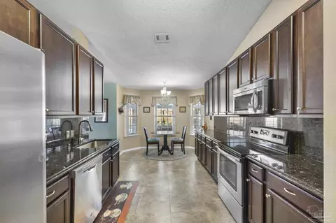 Kitchen - 716 Britain Dr, Cantonment, FL 32533 photo 3 of 5