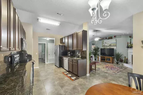 Kitchen - 716 Britain Dr, Cantonment, FL 32533 photo 2 of 5