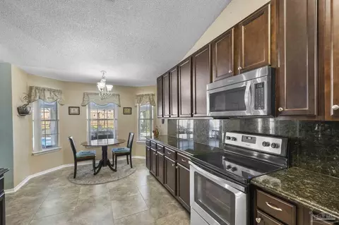 Kitchen - 716 Britain Dr, Cantonment, FL 32533 photo 4 of 5