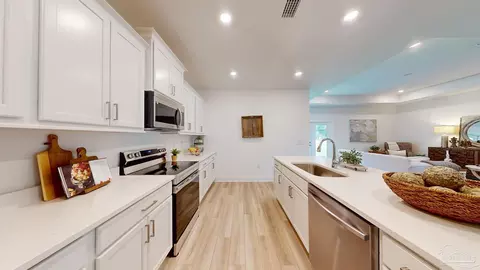 Kitchen - 5396 Cornwall Dr #LOT 77, Milton, FL 32583 photo 3 of 4