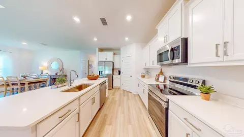 Kitchen - 5396 Cornwall Dr #LOT 77, Milton, FL 32583 photo 4 of 4