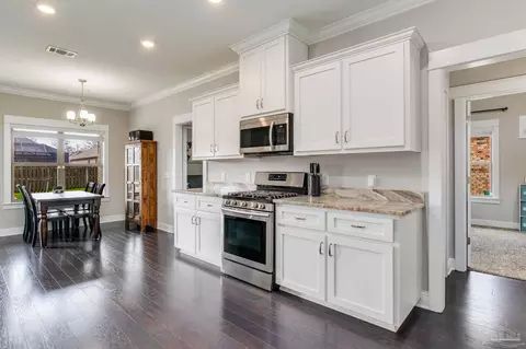Kitchen - 1547 Cadence Loop, Cantonment, FL 32533 photo 5 of 6