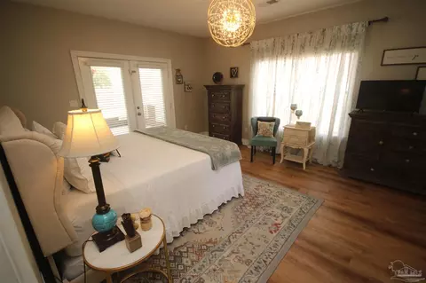 Bedroom - 6049 W Cambridge Way, Pace, FL 32571 photo 9 of 11