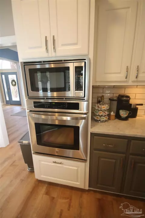 Kitchen - 6049 W Cambridge Way, Pace, FL 32571 photo 3 of 7