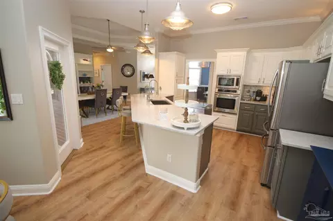 Kitchen - 6049 W Cambridge Way, Pace, FL 32571 photo 6 of 7