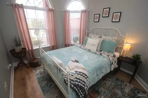 Bedroom - 6049 W Cambridge Way, Pace, FL 32571 photo 7 of 11