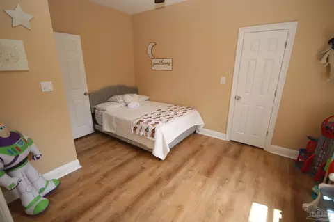 Bedroom - 6049 W Cambridge Way, Pace, FL 32571 photo 4 of 11