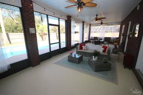 Living - 6049 W Cambridge Way, Pace, FL 32571 photo 1 of 8