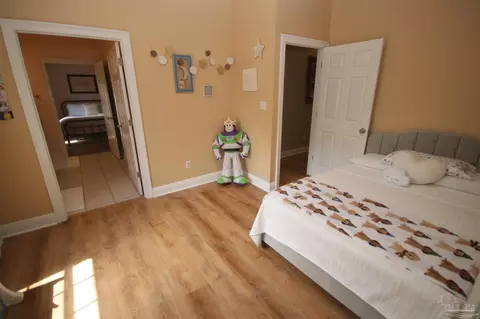 Bedroom - 6049 W Cambridge Way, Pace, FL 32571 photo 6 of 11