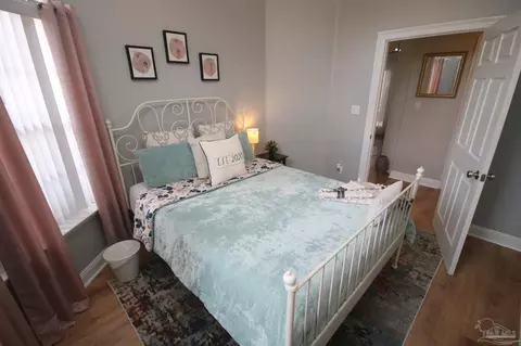 Bedroom - 6049 W Cambridge Way, Pace, FL 32571 photo 8 of 11