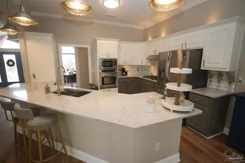 Kitchen - 6049 W Cambridge Way, Pace, FL 32571 photo 7 of 7
