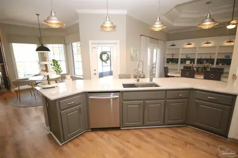 Kitchen - 6049 W Cambridge Way, Pace, FL 32571 photo 5 of 7