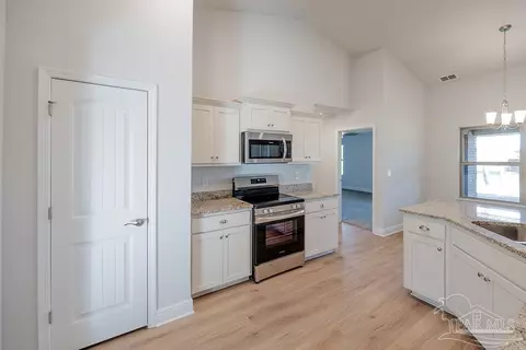 Kitchen - 6494 Benelli Dr, Milton, FL 32570 photo 5 of 5