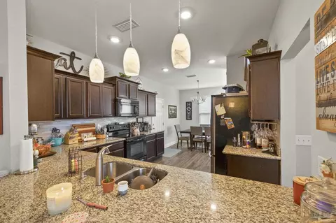 Kitchen - 5595 Blue Sky Ct, Milton, FL 32583 photo 2 of 7