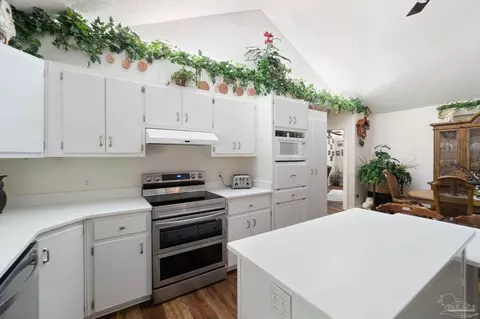 Kitchen - 5522 Chipper Ln, Pace, FL 32571 photo 3 of 5