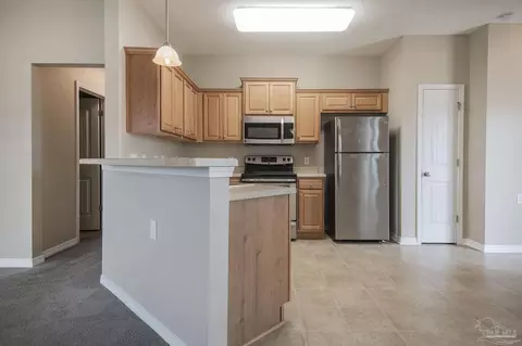 Kitchen - 5789 Corkscrew Ct, Pace, FL 32571 photo 4 of 4