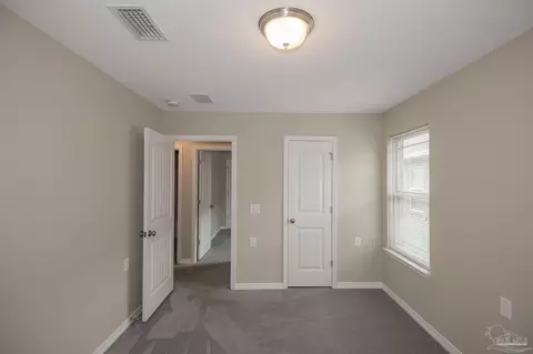 Bedroom - 5789 Corkscrew Ct, Pace, FL 32571 photo 5 of 5