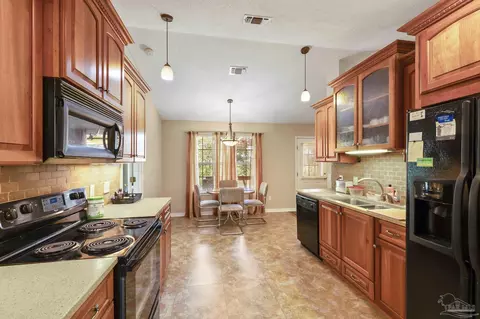 Kitchen - 4713 Frontier Rd, Pace, FL 32571 photo 4 of 6