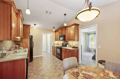 Kitchen - 4713 Frontier Rd, Pace, FL 32571 photo 5 of 6