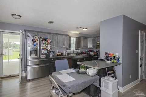 Kitchen - 3080 Pine Forest Rd, Cantonment, FL 32533 photo 4 of 4