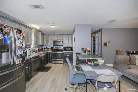 Kitchen - 3080 Pine Forest Rd, Cantonment, FL 32533 photo 2 of 4