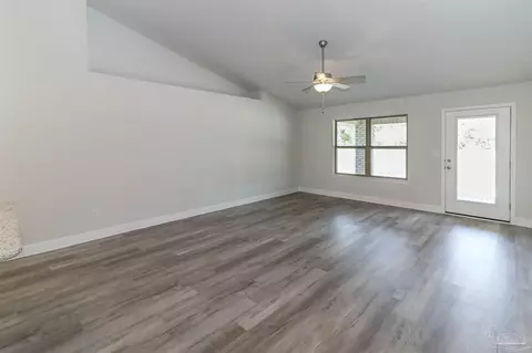 Living - 6463 Benelli Dr, Milton, FL 32570 photo 2 of 2