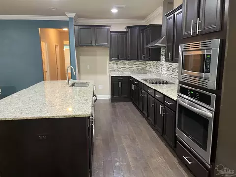 Kitchen - 4495 Oak Orchard Cir, Pace, FL 32571 photo 4 of 6