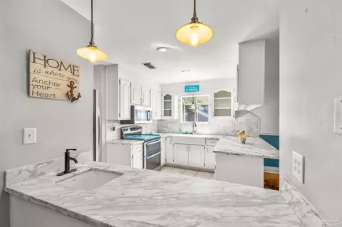 Kitchen - 5216 Rowe Trl, Pace, FL 32571 photo 2 of 3