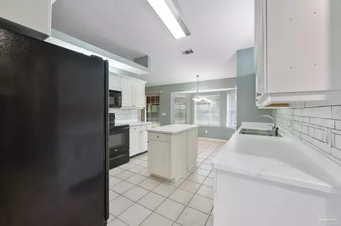 Kitchen - 5207 Deer Creek Dr, Pace, FL 32571 photo 5 of 5