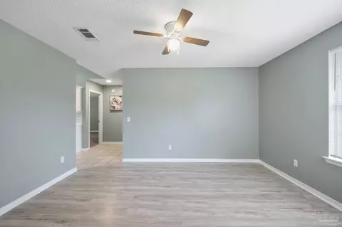 Living - 5207 Deer Creek Dr, Pace, FL 32571 photo 1 of 7