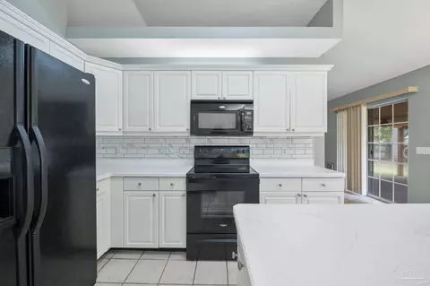 Kitchen - 5207 Deer Creek Dr, Pace, FL 32571 photo 4 of 5