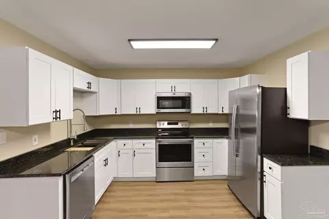 Kitchen - 4654 W Spencer Field Rd, Pace, FL 32571 photo 4 of 4