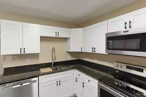 Kitchen - 4654 W Spencer Field Rd, Pace, FL 32571 photo 3 of 4