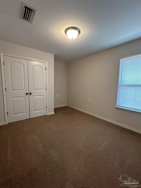 Bedroom - 5793 Corkscrew Ct, Pace, FL 32571 photo 3 of 3