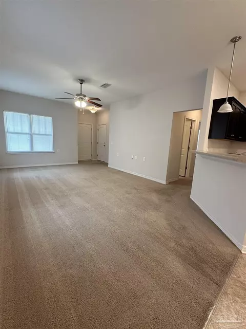 Living - 5793 Corkscrew Ct, Pace, FL 32571 photo 2 of 2