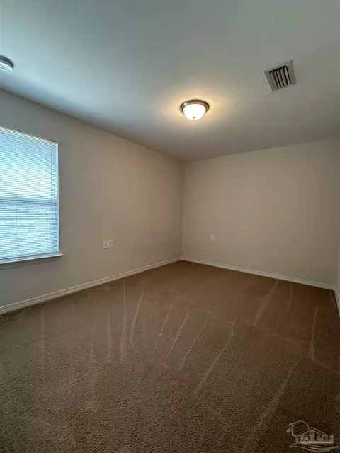 Bedroom - 5793 Corkscrew Ct, Pace, FL 32571 photo 2 of 3