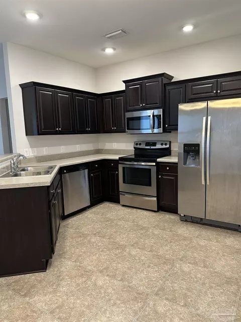 Kitchen - 5793 Corkscrew Ct, Pace, FL 32571 photo 1 of 2