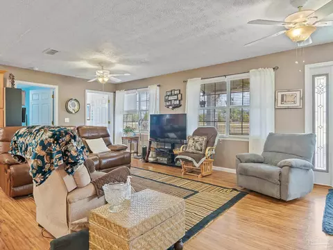 Living - 23281 NW Black Bottom Rd, Altha, FL 32421 photo 1 of 2