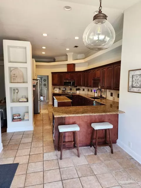 Kitchen - 4115 Lancaster Gate Dr, Pace, FL 32571 photo 2 of 5