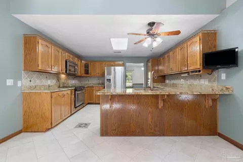Kitchen - 3353 Copperhead Cir, Pace, FL 32571 photo 4 of 4