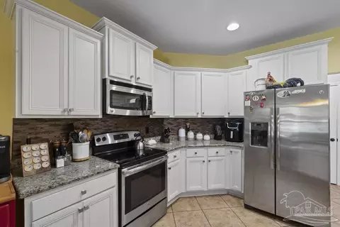 Kitchen - 4141 Dundee Crossing Dr, Pace, FL 32571 photo 3 of 5