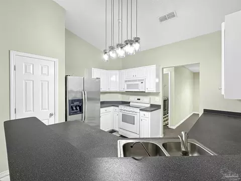 Kitchen - 4831 La Casa Cir, Pace, FL 32571 photo 2 of 2